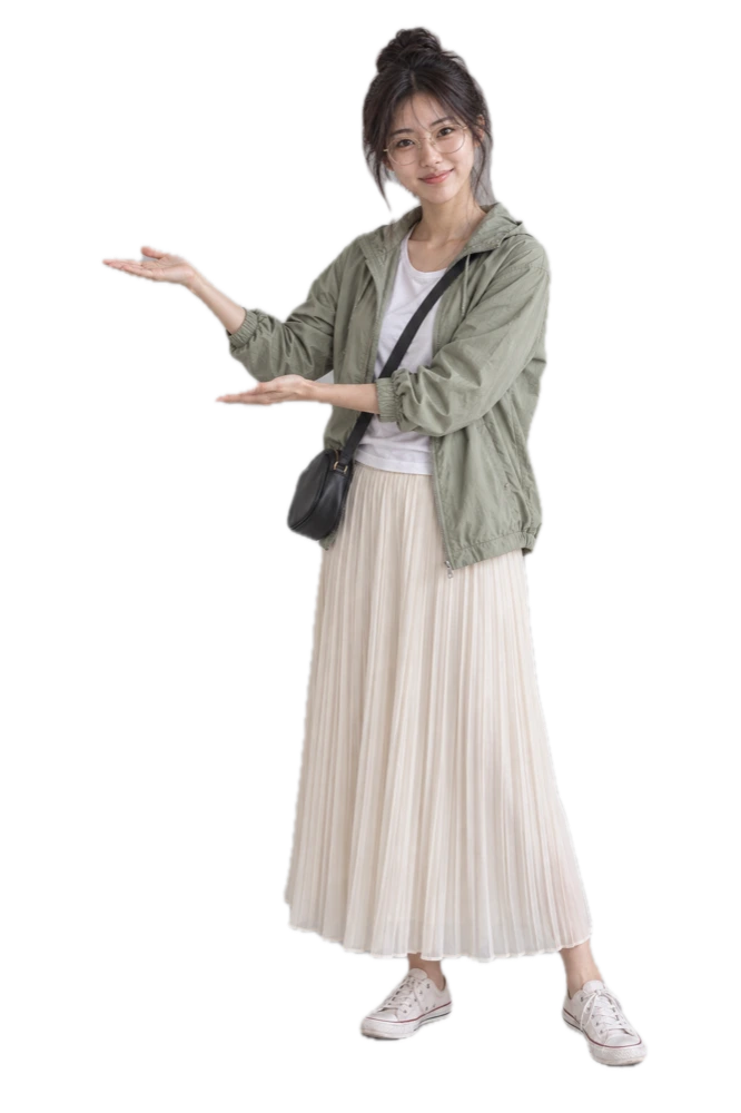 Hana, nineteen, in a sage windbreaker and a long cream skirt, both arms held out toward her page